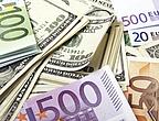 Dollar Scheine und Euro Scheine